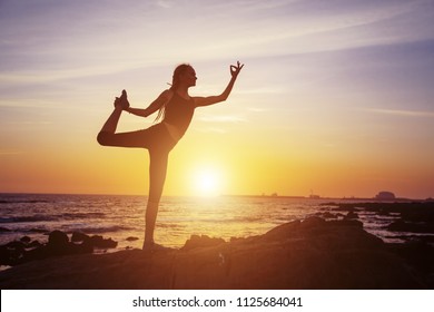 Female Yoga Silhouette On Sea Sunset