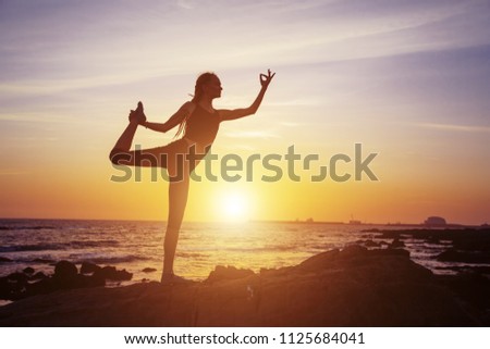 Similar – Women doing pilates on the beach