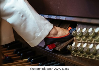 A Female's Foot On The Pedal Of The Fortepiano