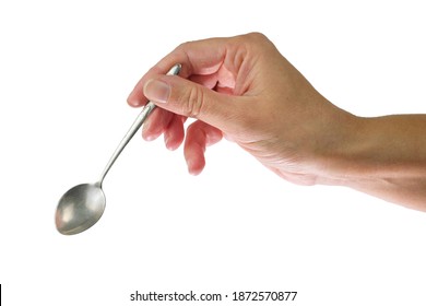 Female's hand holding steel spoon in the right hand, isolated on a white background