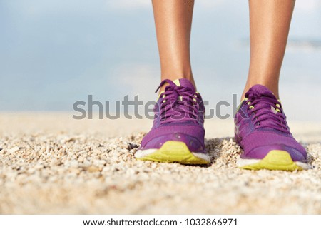 Similar – Image, Stock Photo Women’s summer shoes and hat for beach holidays