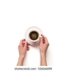 Female(woman) Hand Hold A White Espresso Cup With Coffee Isolated White And Top View.