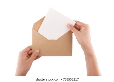 A Female(woman) Hand Hold(open) A Envelope And Post Card On The Wood Desk, Top View At The Studio.