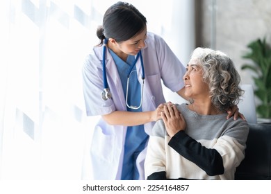 Femalr doctor give empathy encourage retired patient sit on sofa at home hospital.
 - Powered by Shutterstock