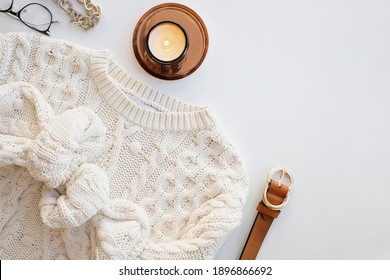 Feminine fashion flat lay with knitted sweater