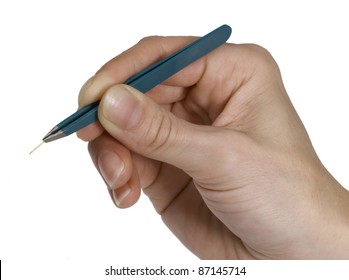 Feminine Hand Holding A Pair Of Tweezers Gripping A Small Splinter In White Back