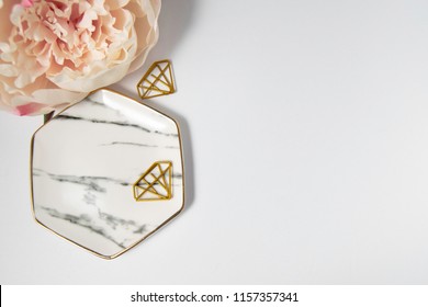 Feminine Pink Styled Desktop With Marble Plate, Blush Pink Peony, And Gold Diamond Paperclips