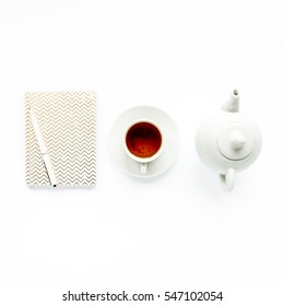 Feminine Trendy Home: Diary, Teapot, Tea Mug And White Pen. Flat Lay, Top View