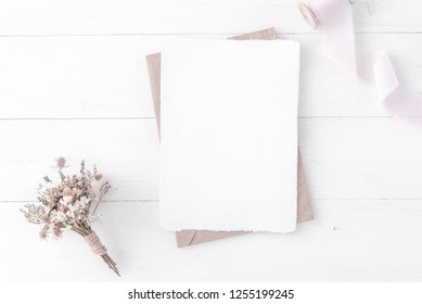 Feminine Wedding, Birthday Desktop Mock-up. Invitation Card Mockup, Template Blank Greeting Cards, Rspv Card, 5x7, Card, Craft Envelope. Silk Ribbons, Pink, Dry Flowers. White Wooden Background. Flat