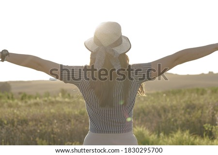 Similar – Image, Stock Photo Woman, both hands in the hair, back view