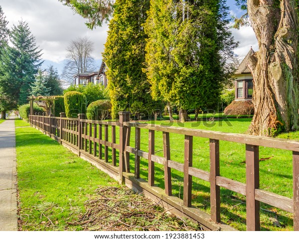 Fence built from wood. Outdoor\
landscape. Security and privacy concept. Vancouver.\
Canada.
