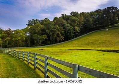 Fence And Farm Field In Rural York County, Pennsylvania.