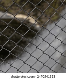 Fence pattern and texture with waterfall background