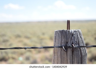 Fence Post In The Middle Of Nowhere In Wyoming