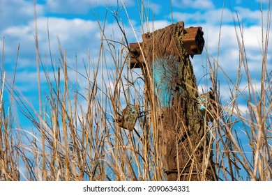 Fence post under a blue sky