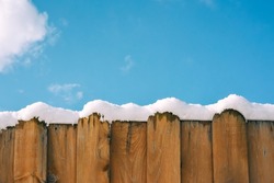 Fence In Snow Against The Sky, Winter Background, Copy Space