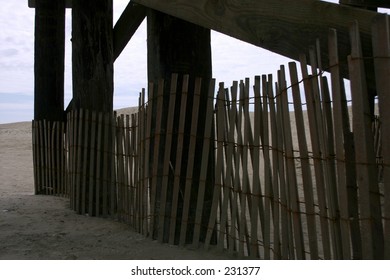 FENCE UNDER PIER