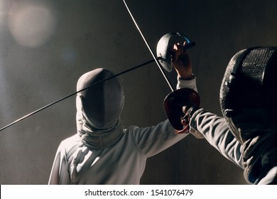 Fencer Woman With Fencing Sword. Fencers Duel Concept.