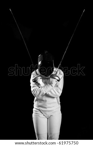 fencing player isolated on black background