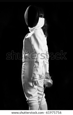 fencing player isolated on black background