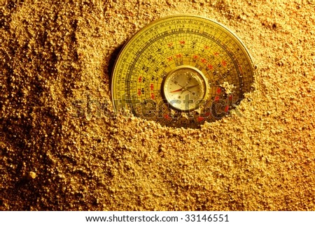 Feng shui compass in Sand