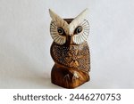 Feng Shui multi-colored owl figurine made of wood