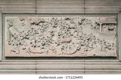 Fengdu, China - May 8, 2010: Ghost City, Historic Sanctuary. Gray Cement Fresco Whereon Many People Congregate And Discuss.