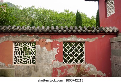 Fengdu County, Chongqing, China, 18.08.2019, Red Wall With White Blinds