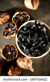 Fermented black garlic in dish 