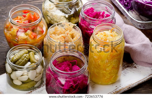 Fermented\
vegetables in jars. Vegetarian food\
concept