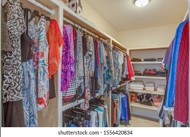 Fernandina Beach, Florida / USA - November 10 2019: Womens Walk-in Closet With Clothes And Shoes