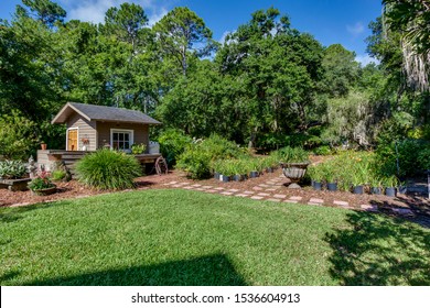 Fernandina Beach, Florida / USA - October 20 2019: Backyard Garden With Stone Pavers