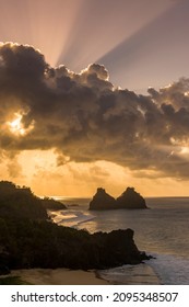Fernando de Noronha Island, Pernambuco, Brazil on December 13, 2021. Sunset and hills two brothers on Cacimba do Padre beach