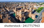 Ferrara - beautiful medieval town in Emilia Romagna Italy. aerial drone view of castle Estense in historic center
