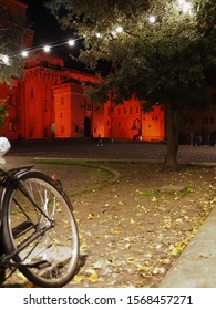 Ferrara, Italy - November 22, 2019. The Este Castle At Night Seen From The Public Park In The Historic Center.