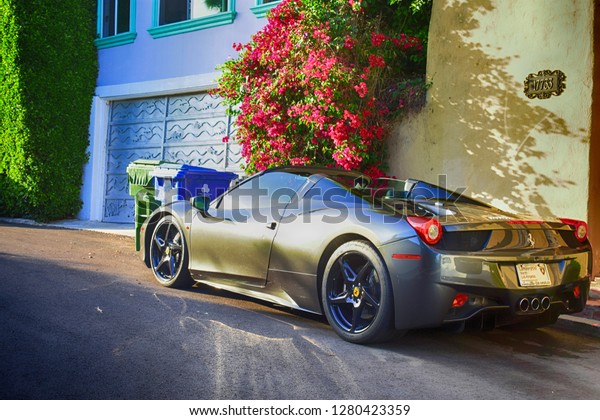 Ferrari parked in front of someone\'s\
house in Malibu,California, united states.\
 \
6/29/2018