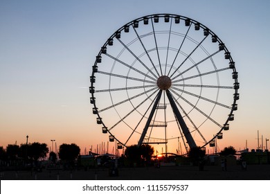 Ferries wheel and sunset - Powered by Shutterstock