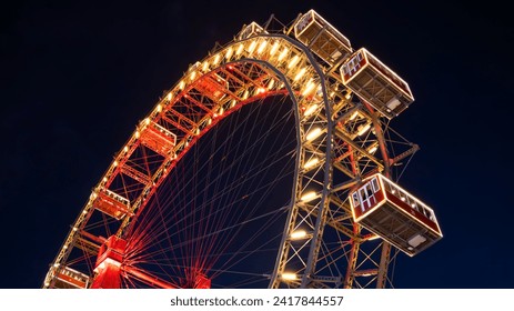 Ferris wheel, amusement rides. Ferris wheel. Night. Fair. Vienna, Austria. - Powered by Shutterstock