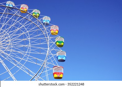 Ferris Wheel in blue sky at Luna park, Sydney