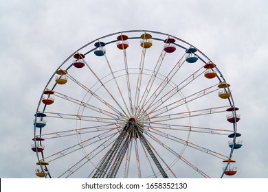 Ferris Wheel in front of Cloudy Sky in Alexandria, Virginia, United States