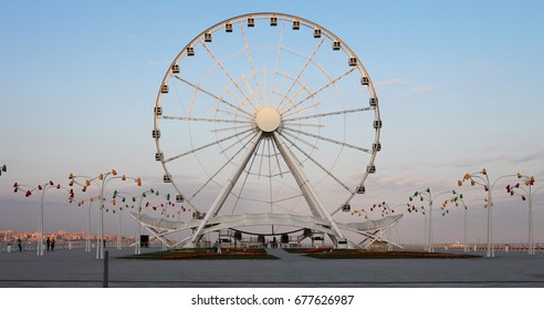Ferris wheel in front of sky. Big carousel in Baku