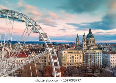 Ferris wheel In Hungary Budapest. Erzsebet square, St Stephen Basilica, Andrassy street. Budapest Eye