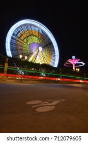 Ferris Wheel long exposure with car light trails