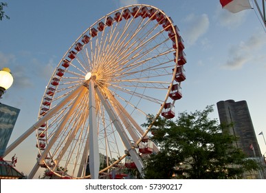 Ferris Wheel At Navy Pier Park In Chicago At Dusk.