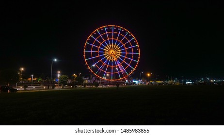 Ferris wheel an night in Batumi, Georgia. Promenade In Miracle Park, Amusement City Park in Night Time
 - Powered by Shutterstock