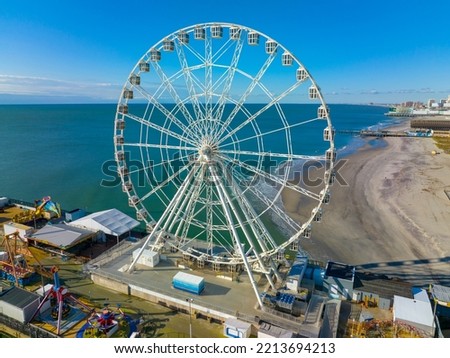 Ferris Wheel on Steel Pier next to Boardwalk in Atlantic City, New Jersey NJ, USA. 