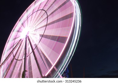 Ferris wheel over night sky