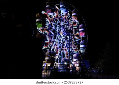 Ferris wheel Ride at Night Market. Neon lights that decorate the ferris wheels. Night Market. Tourist destination. Holidays and Vacations. Amusement park photography Concept - Powered by Shutterstock