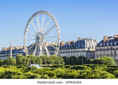 Ferris wheel (Roue de Paris) on the Place de la Concorde from Tuileries Garden. Ferris wheel was installed for 2000 millennium celebrations. Paris, France. - Powered by Shutterstock