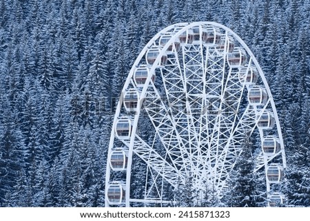 Ferris Wheels in winter. Winter holidays in the Carpathians. Attraction in the recreational park in Bukovel. 